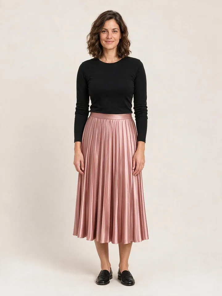 The same shopper wearing the rose pleated skirt
